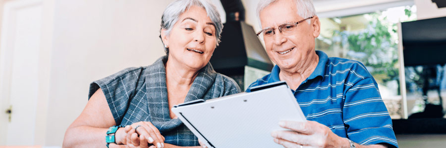 A couple updating their retirement strategy with longevity insurance